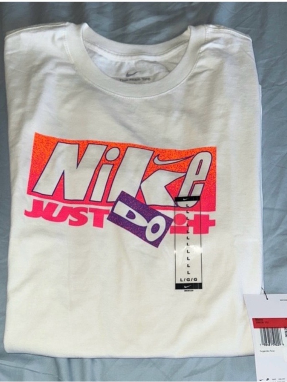 Nike White Tee with Pink, Orange and Purple Graphic